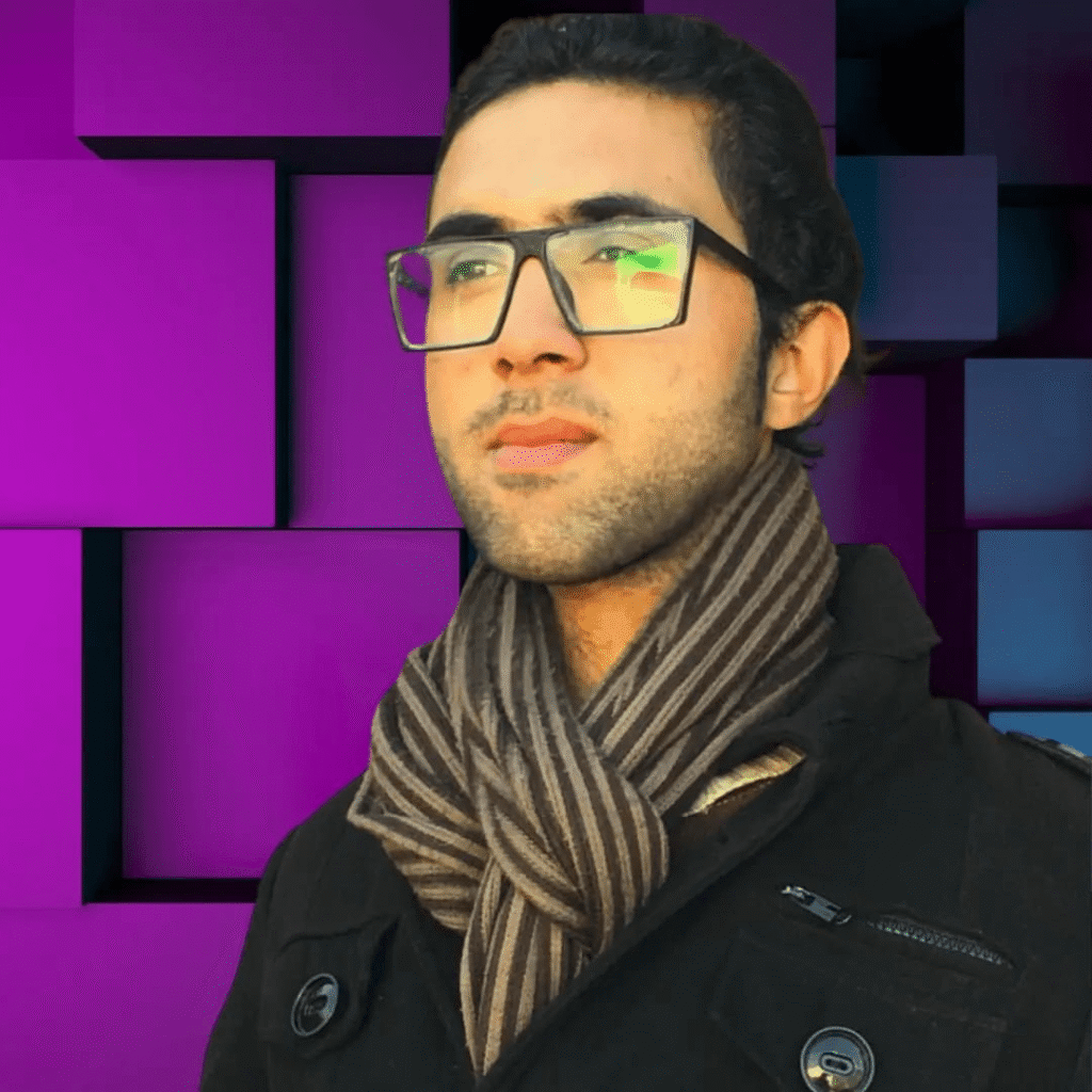 Home decor expert in glasses and striped scarf posing confidently with 3D modern purple cubes in the background