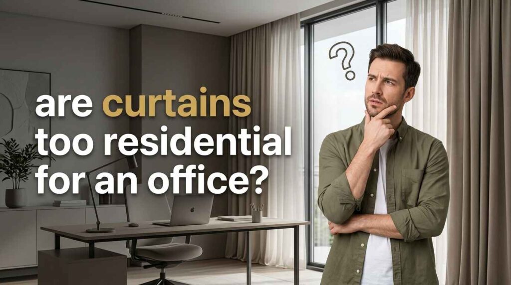 A professional man in a modern workspace is evaluating whether window drapes are suitable for a business office with neutral curtains, a desk setup, and large glass windows.